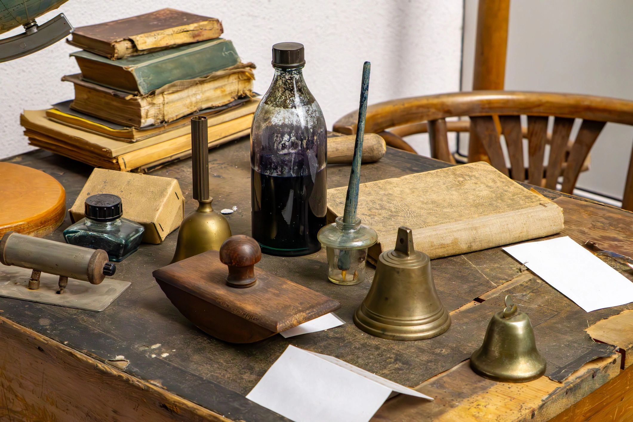 Vintage desk with old books and historical papers