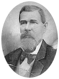 Vintage portrait of a bearded man in a suit and bow tie