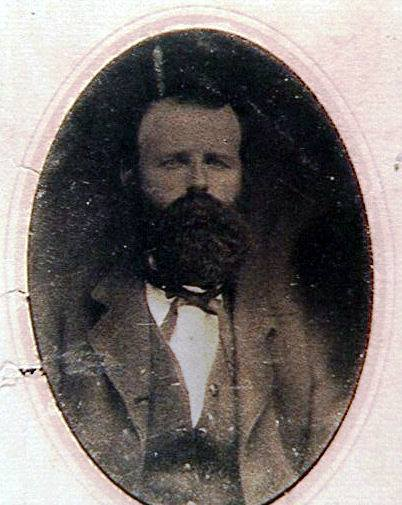 Aged oval portrait of Henry Gonzalvo Woods in 19th-century formal attire